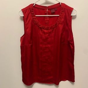**Sleeveless red blouse